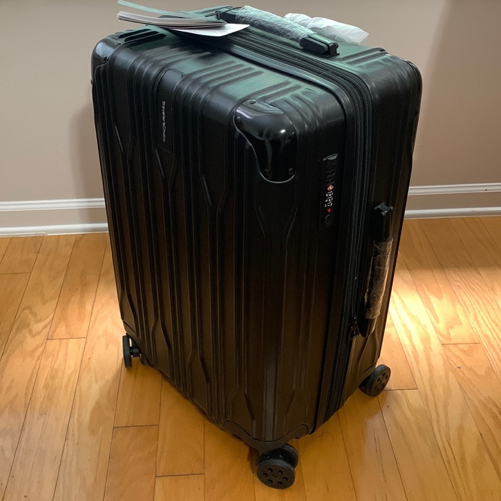 Traveler’s Choice Black Hard-case 24” Suitcase